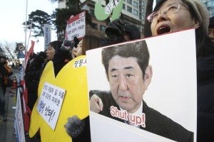 Korean demonstrators offer advice to Japanese Prime Minister Shinzo Abe